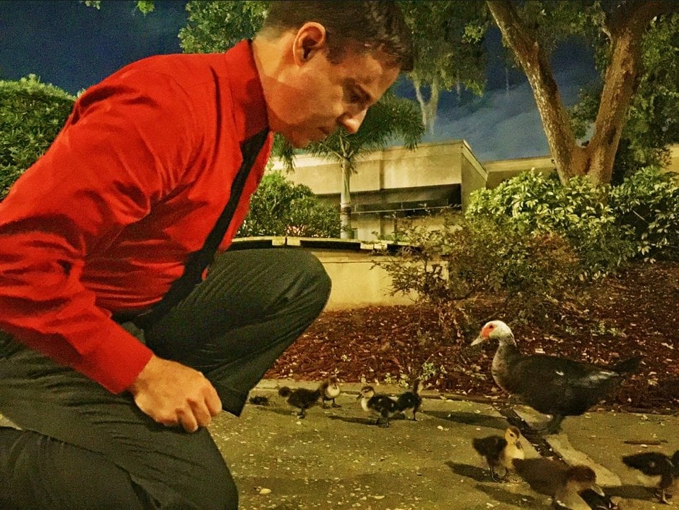 Mr. Kraftwerk feeds the ducks.