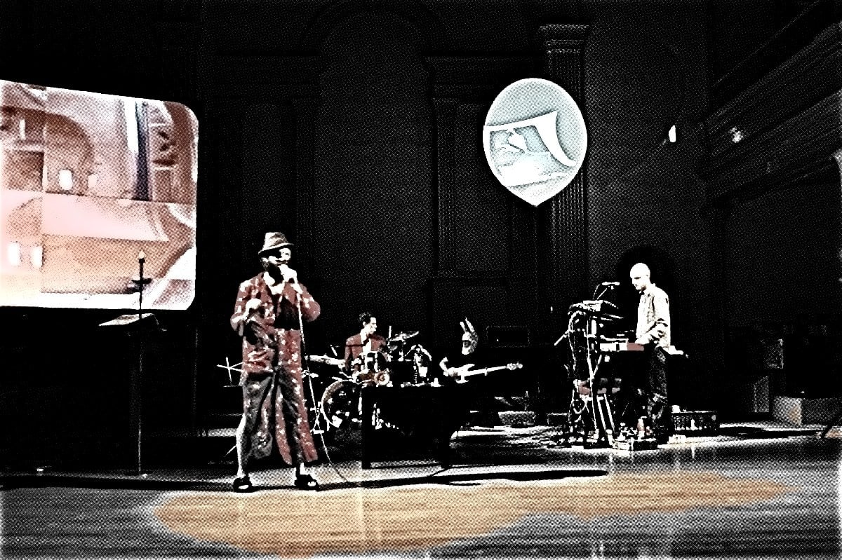 The Children… on stage playing live with visuals