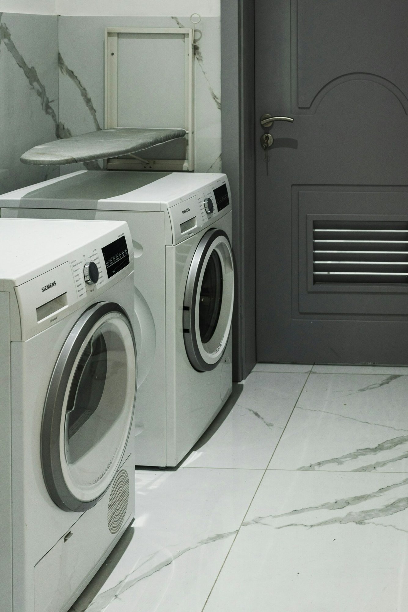 Laundry room with two washing machines