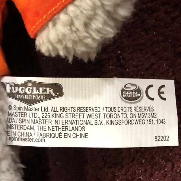 Fuzzy Munch Munch Fuggler tush tag front