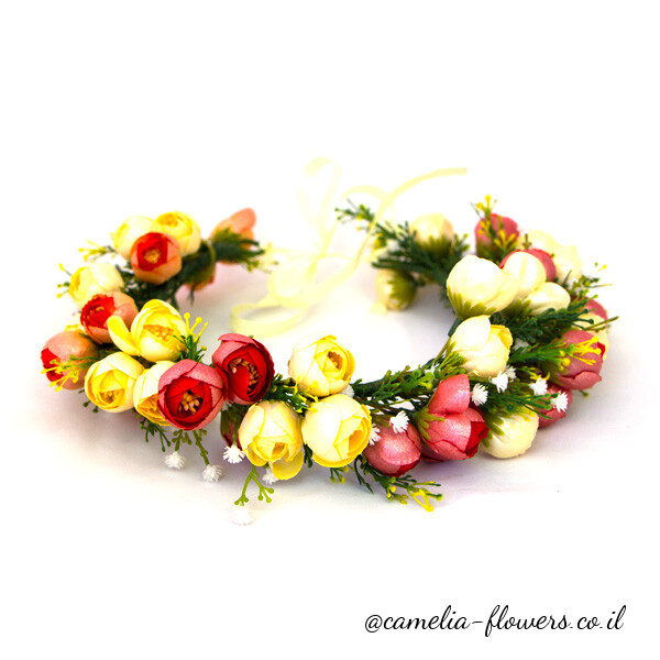 A flower crown from a цветочный магазин with yellow, red and white flowers.