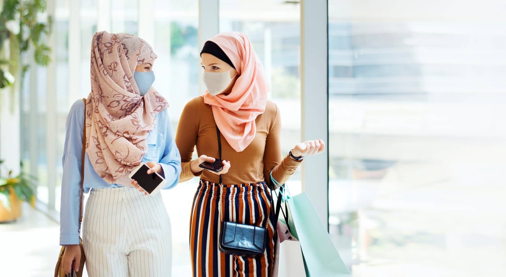 New immigrants are stitching masks that can be worn comfortably with a hijab