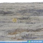 Silver Travertine Slabs Stacked in Factory