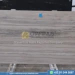 Silver Travertine Slabs Stacked in Factory