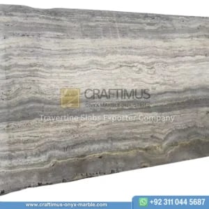 Silver Travertine Slabs Stacked in Factory