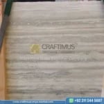 Silver Travertine Slabs Stacked in Factory