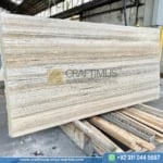 Silver Travertine Slabs Stacked in Factory
