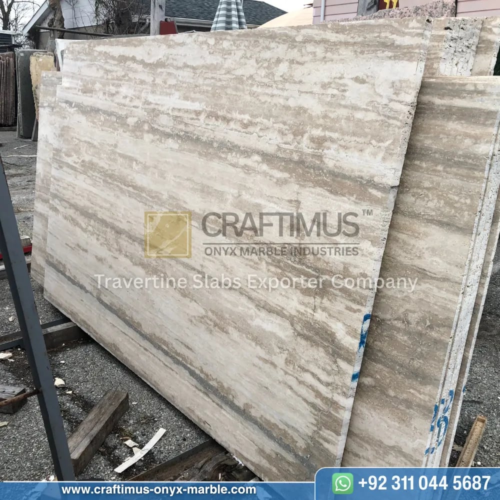 Silver Travertine Slabs Stacked in Factory