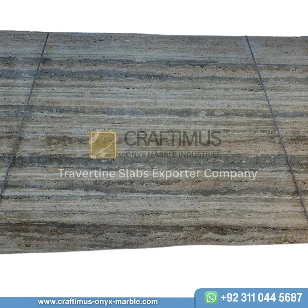 Silver Travertine Slabs Stacked in Factory