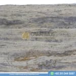 Silver Travertine Slabs Stacked in Factory