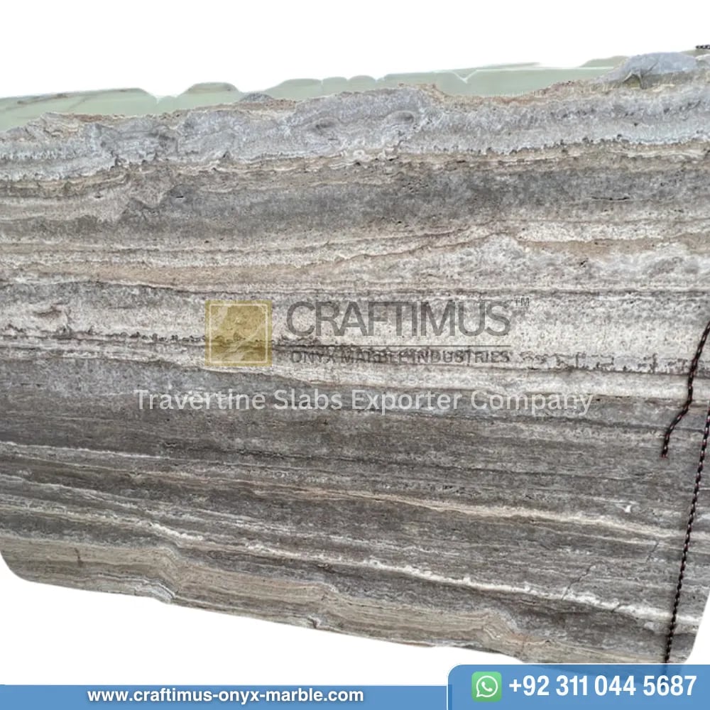 Silver Travertine Slabs Stacked in Factory