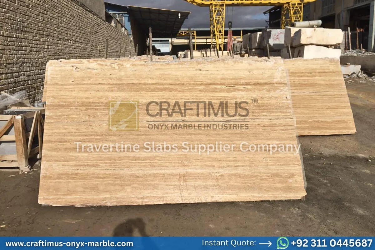 Stacked beige travertine stone slabs