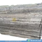 Silver Travertine Slabs Stacked in Factory