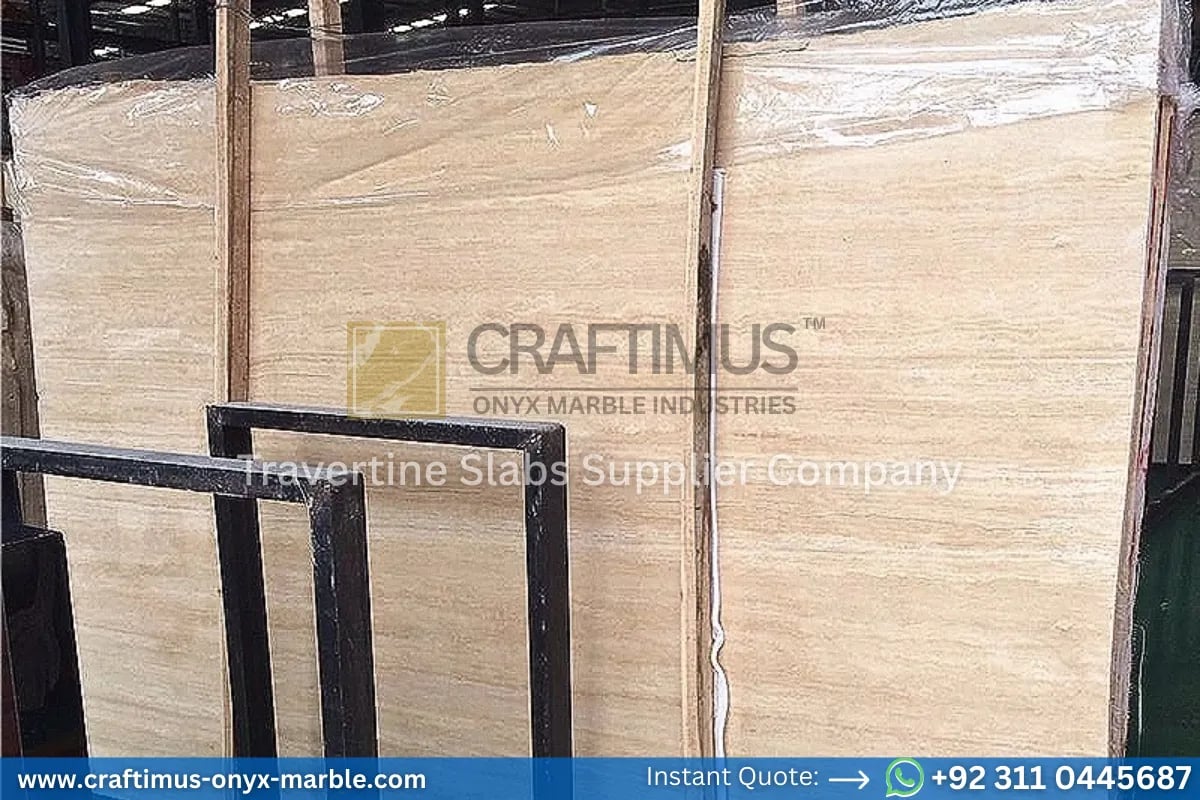 Stacked beige travertine stone slabs