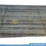 Silver Travertine Slabs Stacked in Factory