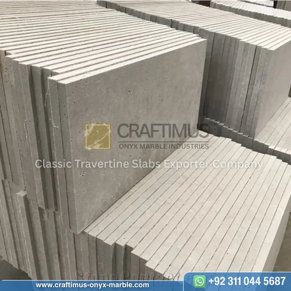 Light Beige Travertine tiles stacked in factory after production