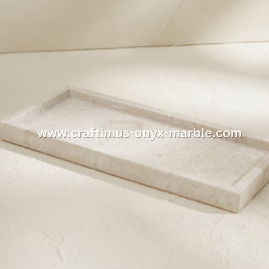 Handcrafted travertine rectangular tray with a textured natural stone surface and visible organic holes, designed as a multipurpose decorative platter for serving food, organizing bathroom essentials, or holding accessories on dining tables, kitchen counters, or vanity spaces.



