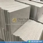 Light Beige Travertine tiles stacked in factory after production