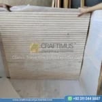 Light Beige Travertine tiles stacked in factory after production