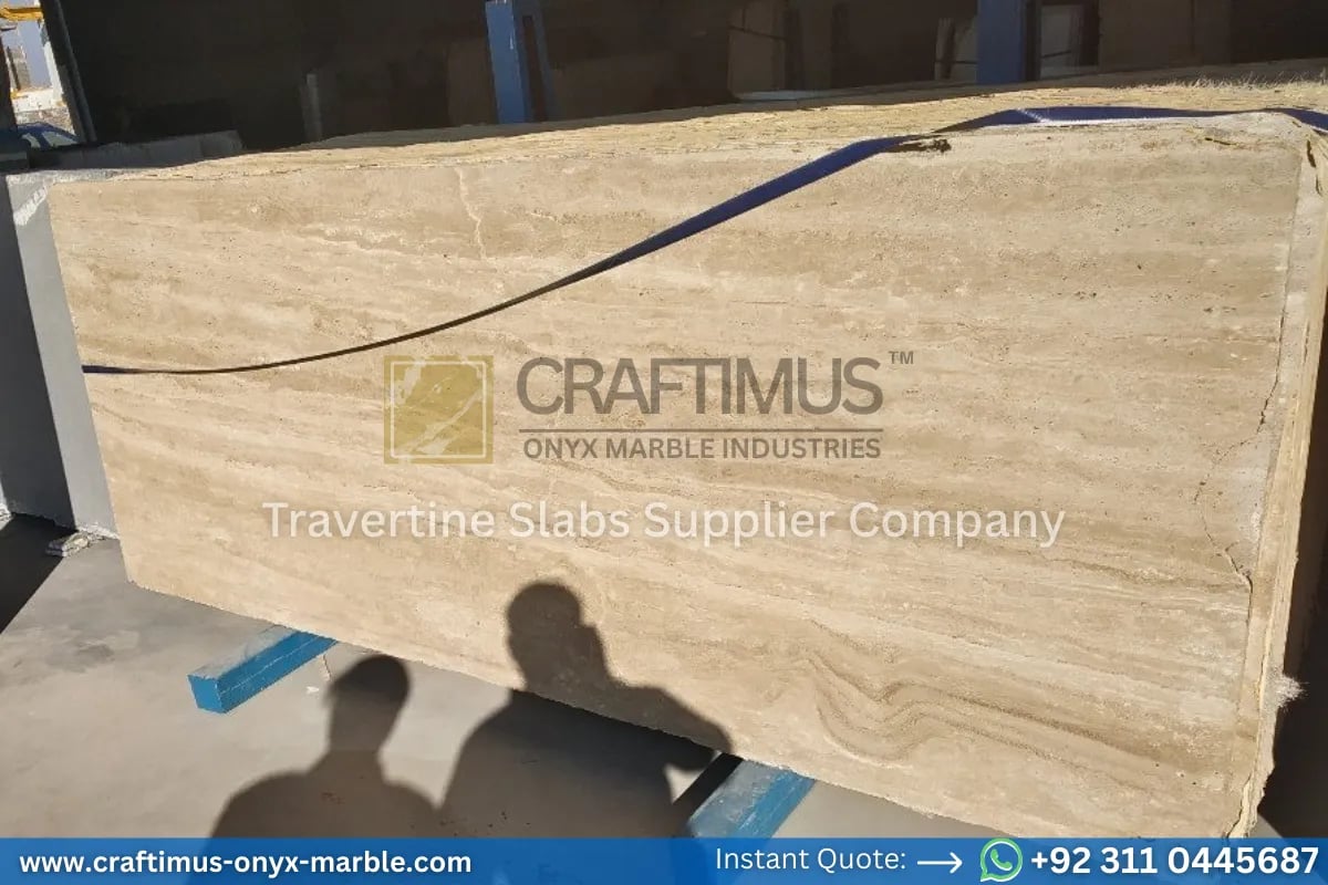 Stacked beige travertine stone slabs