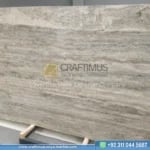 Silver Travertine Slabs Stacked in Factory