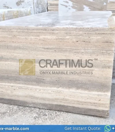 Large, textured silver travertine blocks