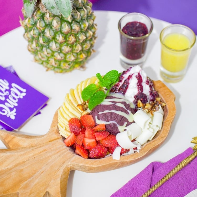 Vibrant superfood acai bowl topped with granola and berries, perfect healthy food in Bali.