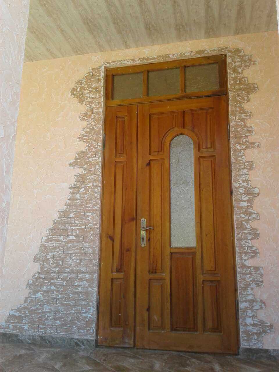 Tencuiala decorativa cu elemente artistice