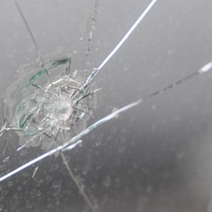 Cracked windscreen windshield of a car vehicle Cracked windscreen windshield of a car vehicle