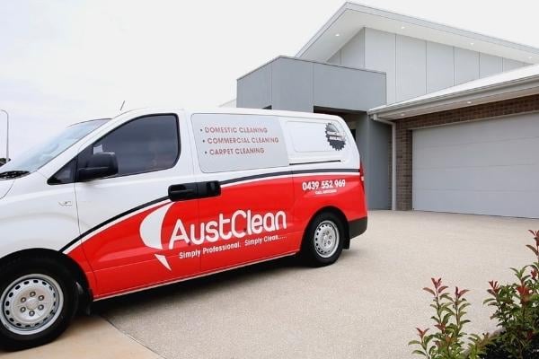 ABOUT 1 AustClean professional cleaning van – red and white branded service vehicle providing domestic, commercial, and carpet cleaning services at residential properties across Australia.