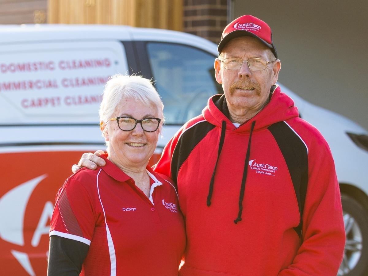 Echuca Cleaning Services 1 Professional AustClean cleaning team - male and female technicians in uniform standing with service van, representing experienced and diverse cleaning professionals across Australia.