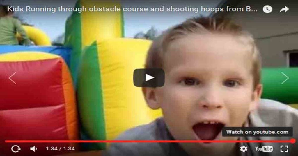 Kid Running in an Obstacal Course