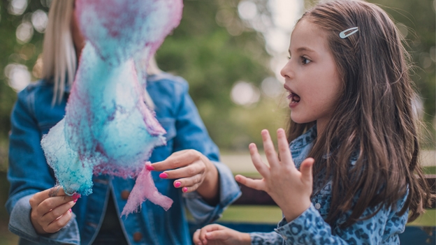 Girls At Birthday Party Eatting Cotton Candy