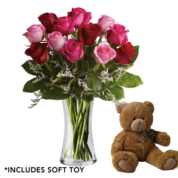 bouquet of pink and red flowers with teddy