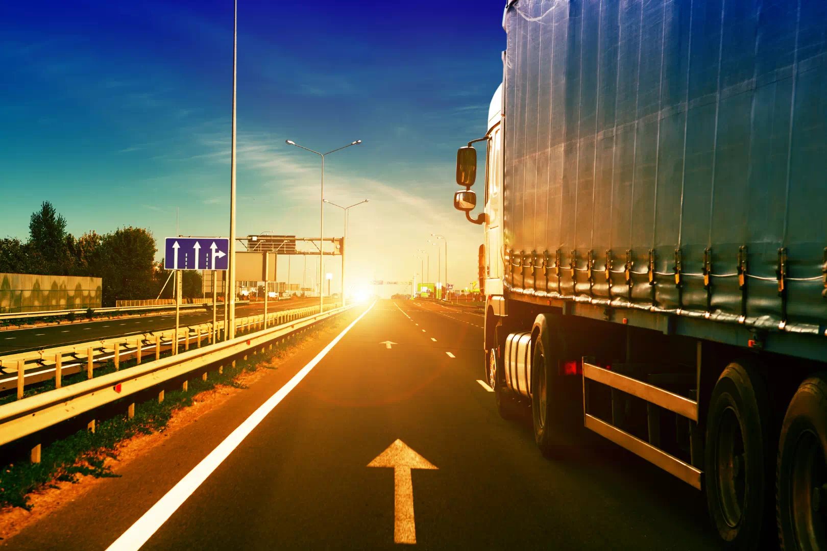 Truck Driving into sunset