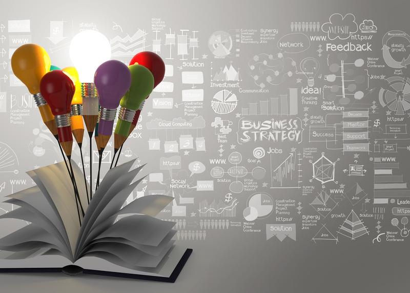 Дээд тал нь чийдэн бүхий өнгөлөг бөмбөлөг болж хувирсан хуудастай нээлттэй ном. Арын дэвсгэр дээр бизнестэй холбоотой графикууд болон "стратеги" болон "санал хүсэлт" зэрэг түлхүүр үгсийг саарал ханан дээр байрлуулсан нь санаа, инновацийг бэлгэддэг. - Business.MN