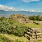 Oaxaca green trees under blue cloudy sky scenery