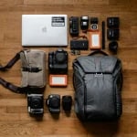 travel packing list gear black DSLR cameras and lenses