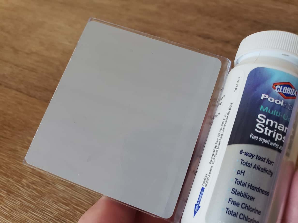 A Clorox Smart Strips container that holds the test strips.