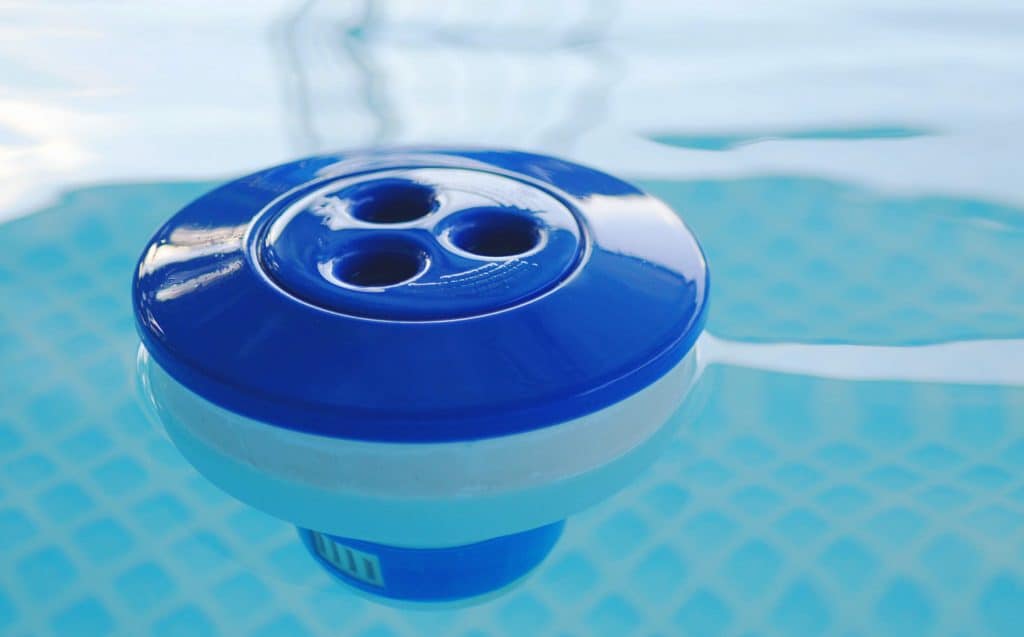 A floating chlorine chlorinator floating on the water.