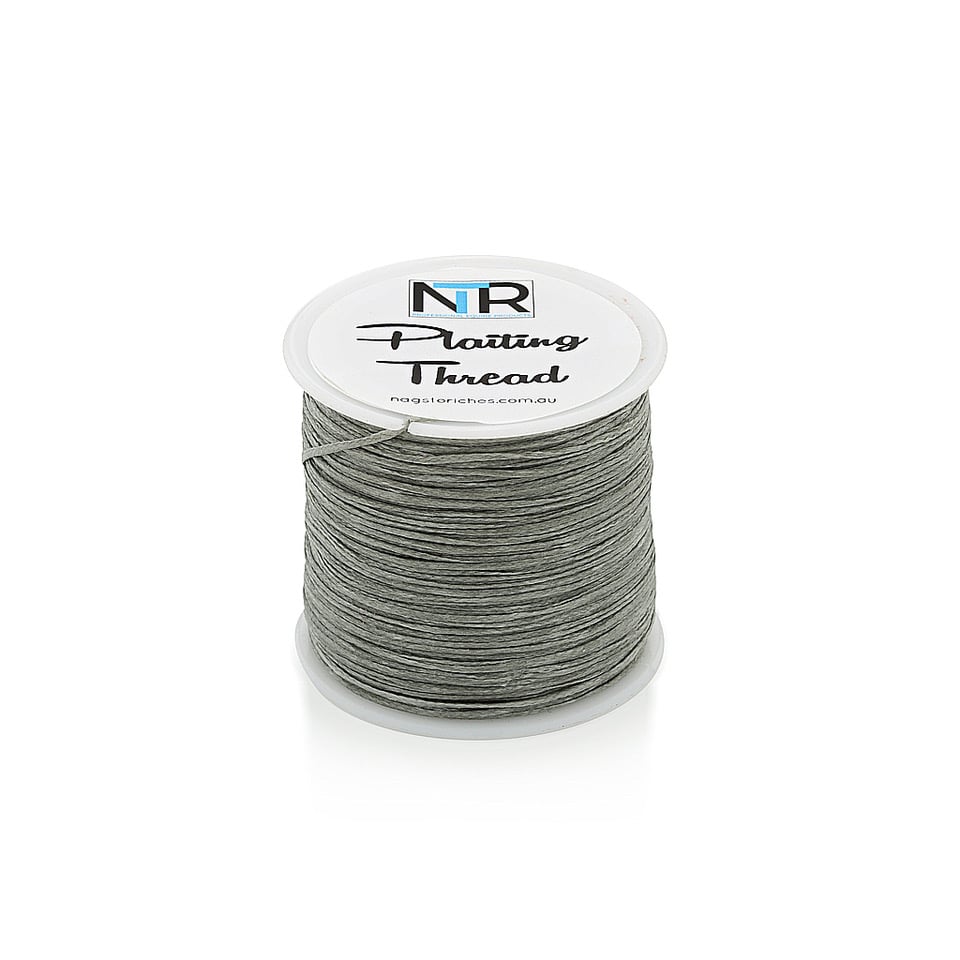 A spool of NTR Plaiting Thread on a white background.