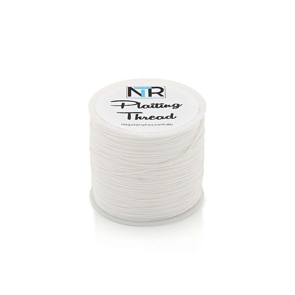 A spool of NTR Plaiting Thread on a white background.