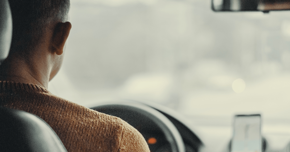 an image of a guy staring at the windscreen