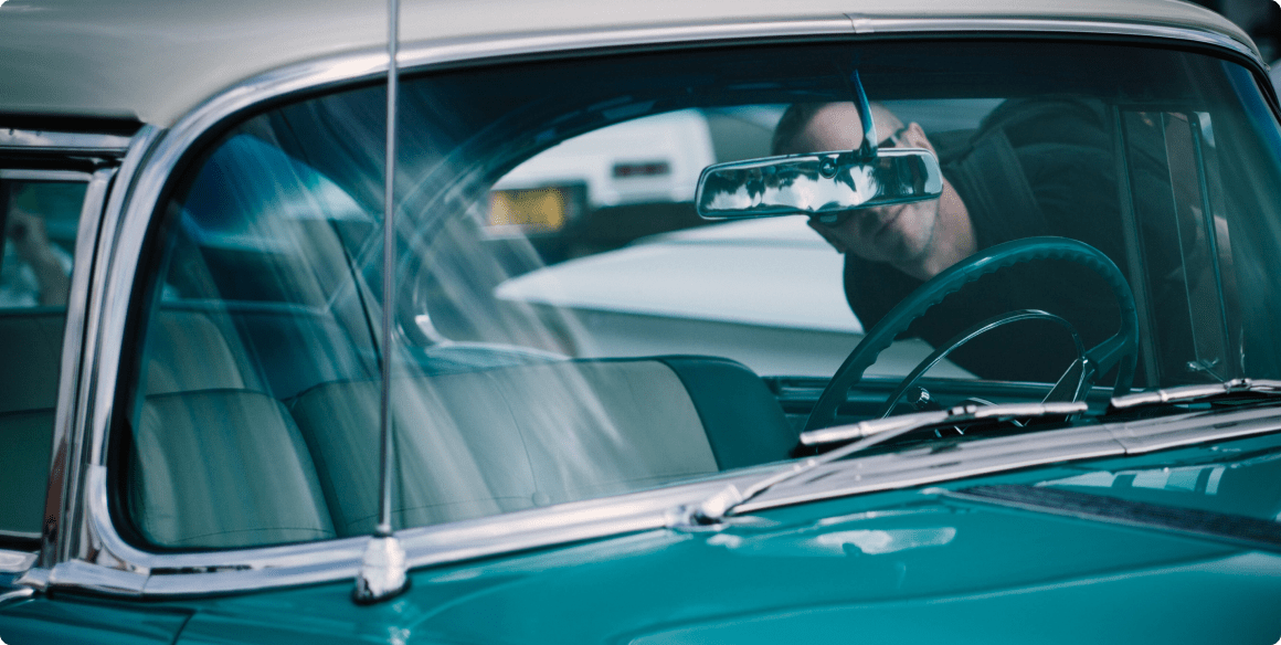Windscreen of a color blue car