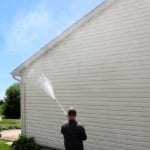 Professional house washing services to enhance curb appeal and eliminate stains caused by algae, moss, and other residues