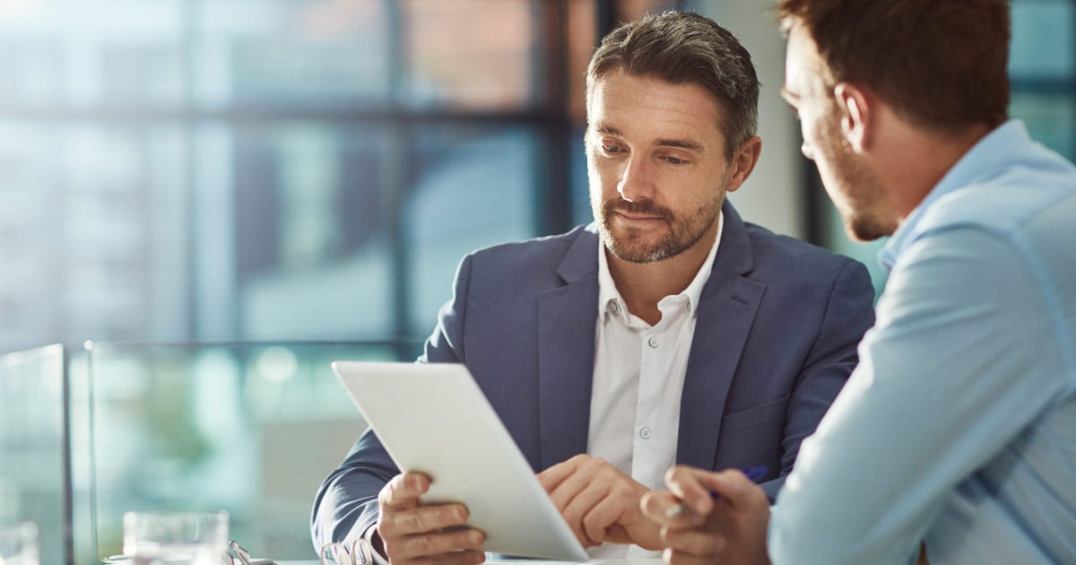 Two men negotiating settlement for personal injury case