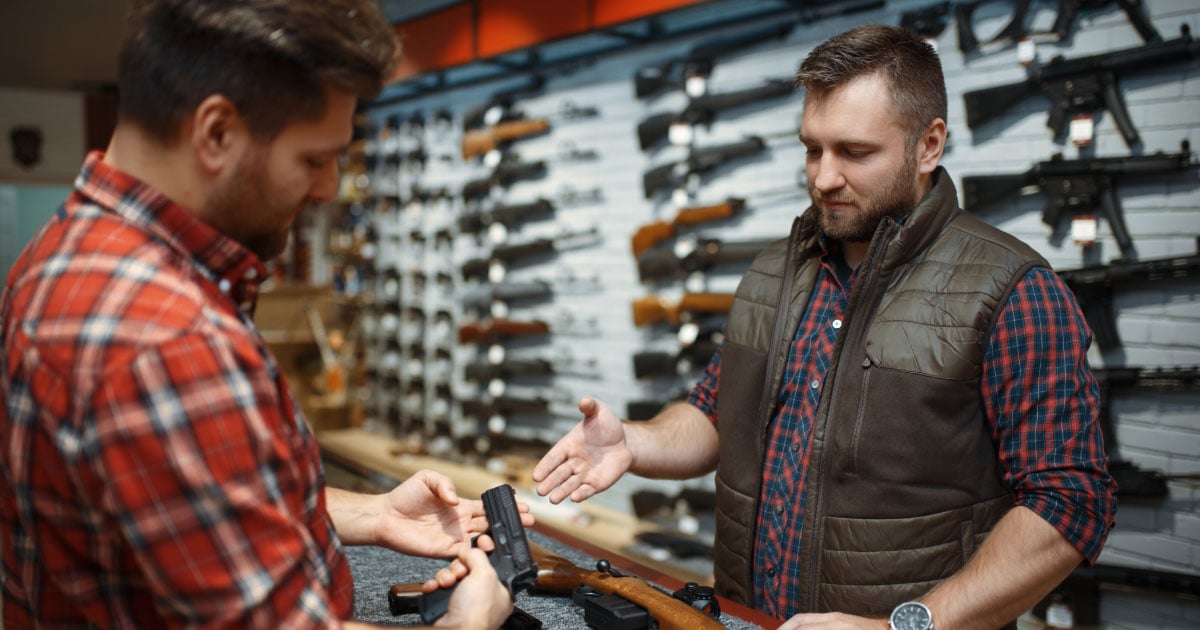 Man purchasing a weapon at a gun store