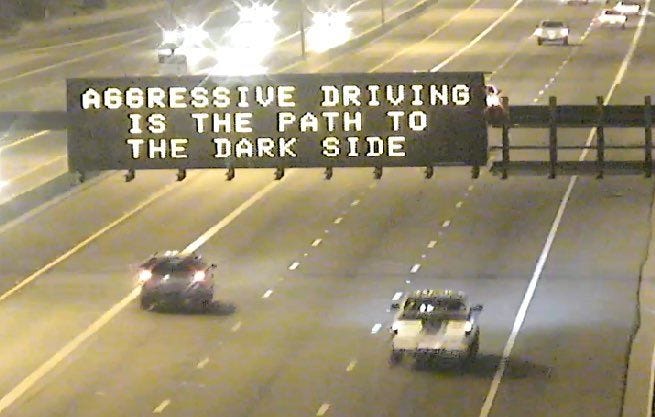 ADOT freeway sign that says "Aggressive driving is the path to the dark side".