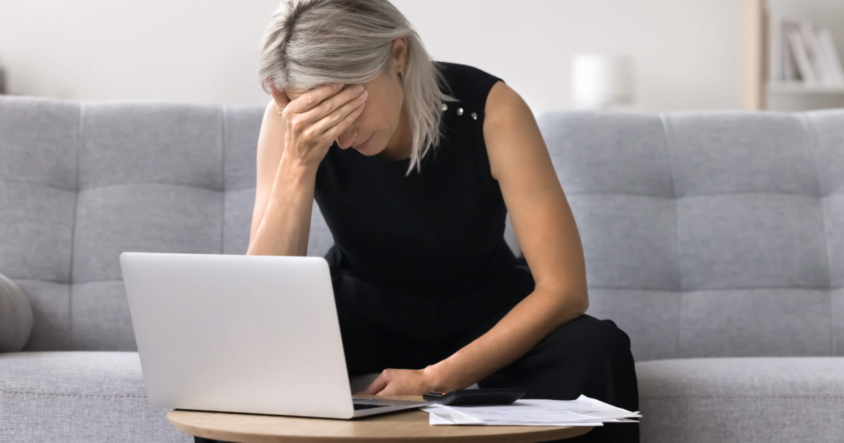 How to Protect Finances During Separation - Woman Upset Holding Hand on Head