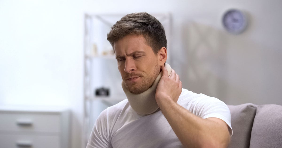 Man with neck injury wearing a brace